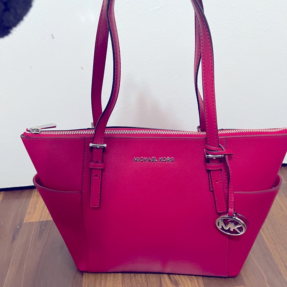 Like new!! Michael Kors dark raspberry medium shoulder bag.